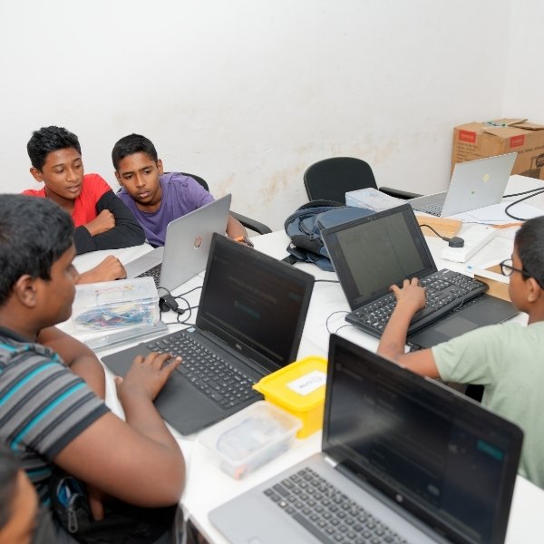 kids smiling with their instructor