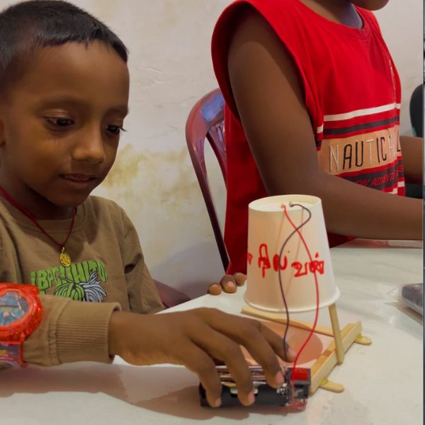 kids smiling with their instructor