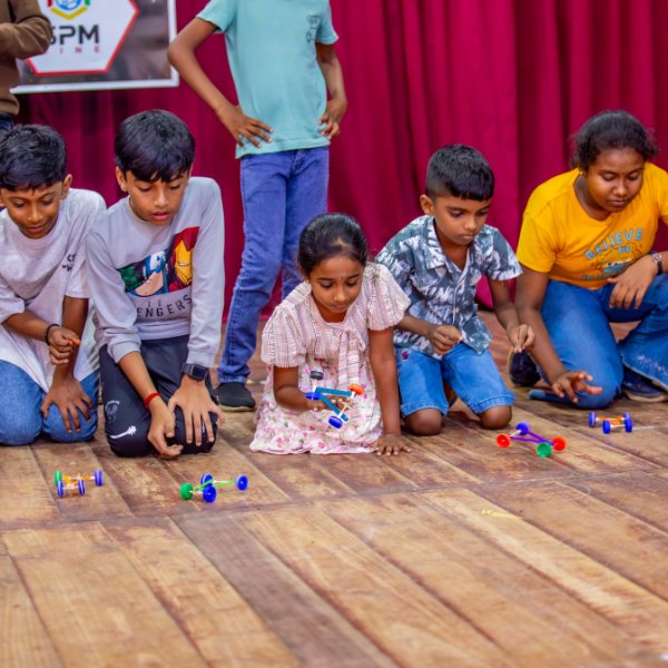 kids smiling with their instructor
