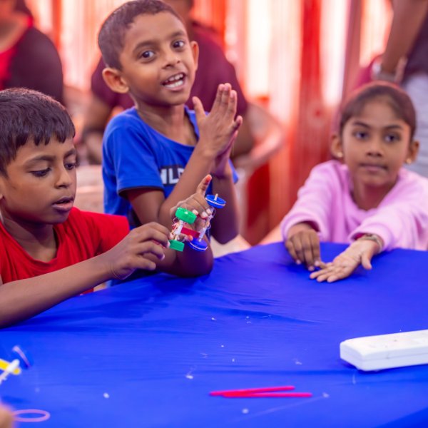 kids smiling with their instructor