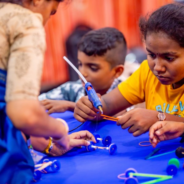 kids smiling with their instructor